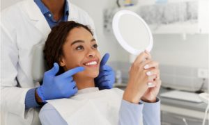 The dentist explains the jaw alignment without surgery.